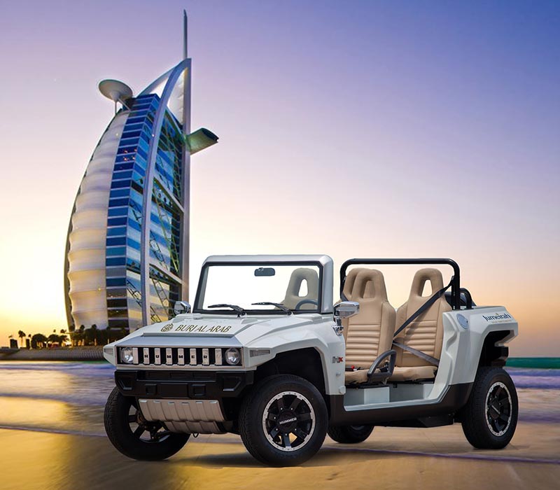 hummer electric cart with burj khalifa in background